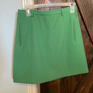 Green mini skirt. Size M.